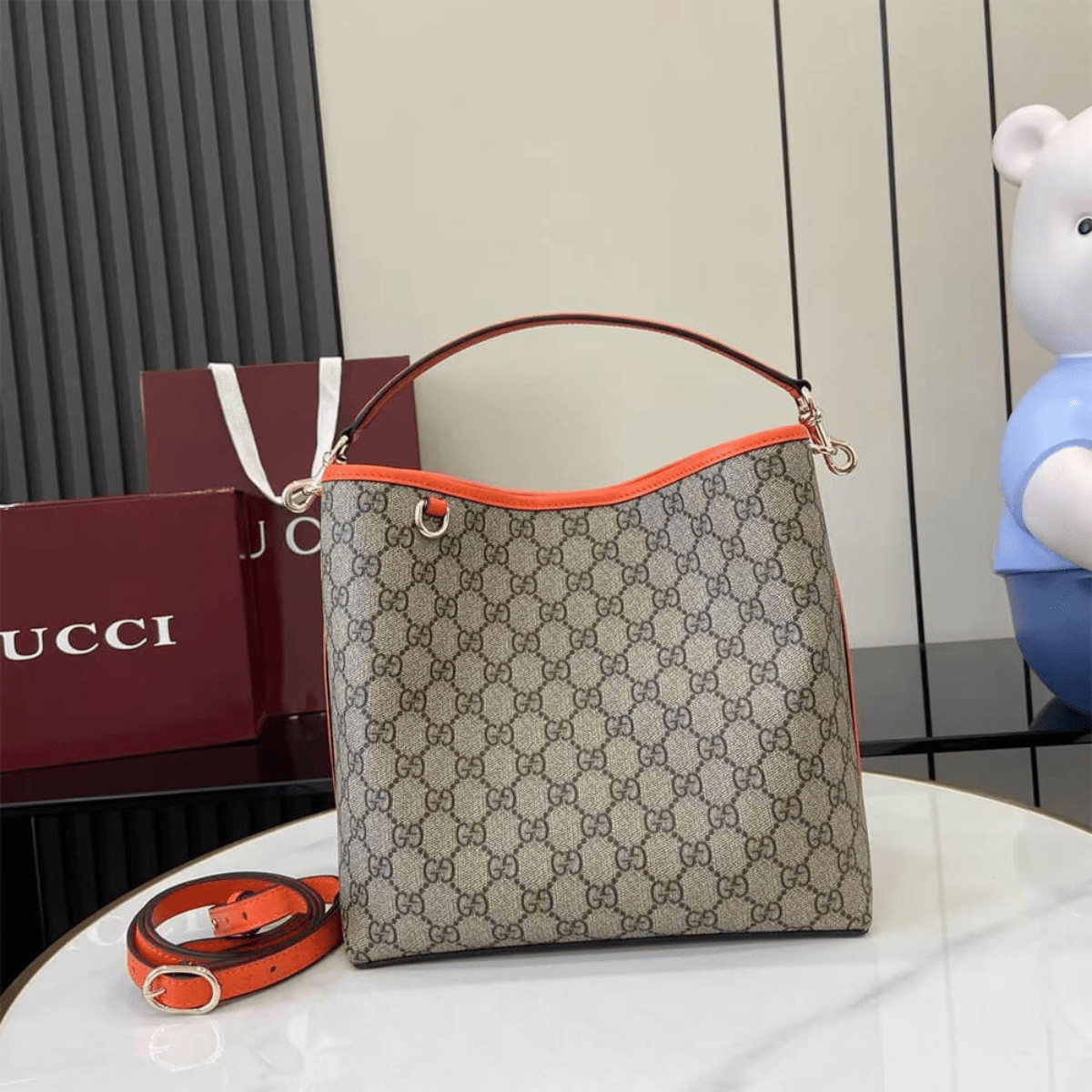 Gucci – Medium GG Emblem Bucket Bag