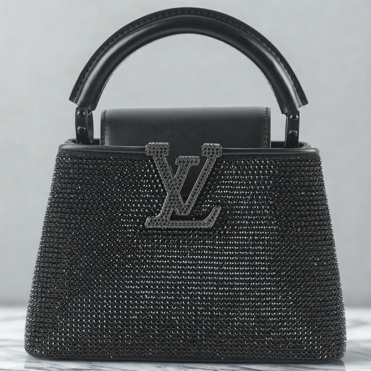 Louis Vuitton – Capucines East-West Mini Bag
