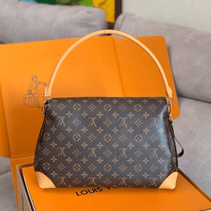 Louis Vuitton – Hide Away MM Bag