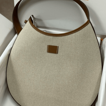 Hermès – P’tit Arçon Bag In Canvas & Leather
