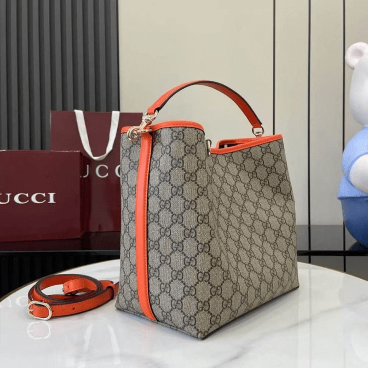 Gucci – Medium GG Emblem Bucket Bag