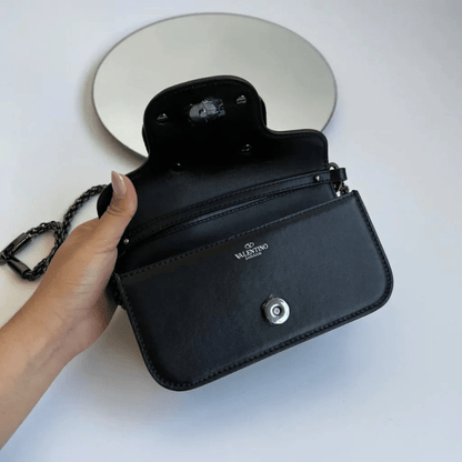 Valentino Garavani – Locò Small shoulder bag with crystal logo