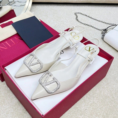 Valentino Garavani – VLogo Signature Diamond Slingbacks in white calfskin