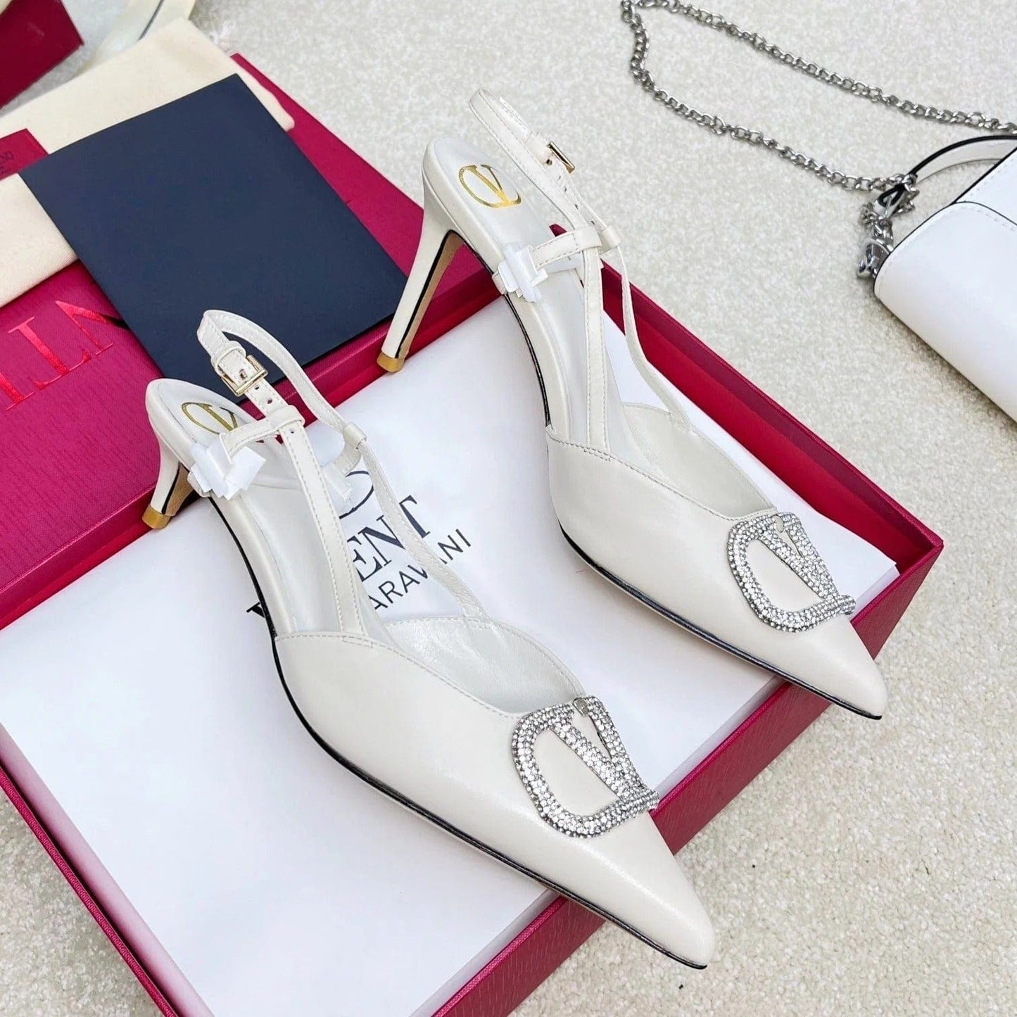 Valentino Garavani – VLogo Signature Diamond Slingbacks in white calfskin