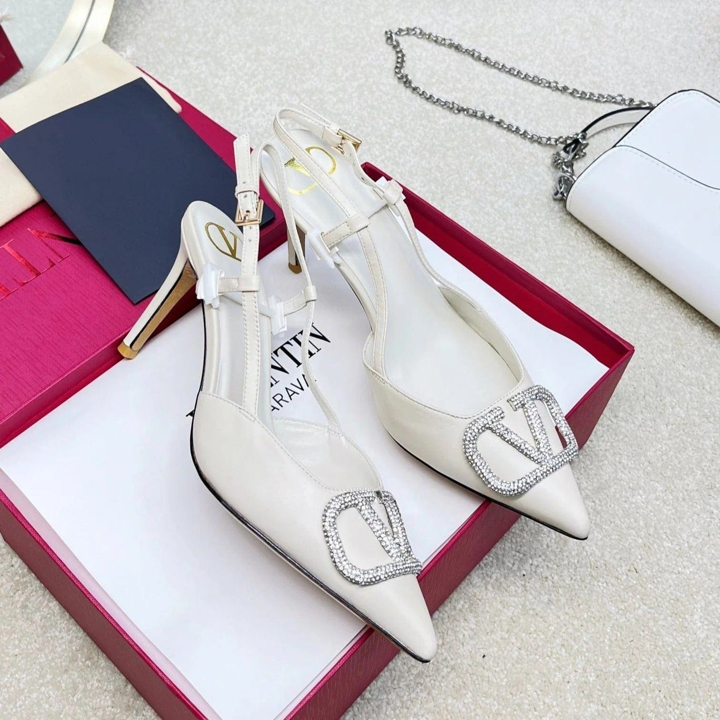 Valentino Garavani – VLogo Signature Diamond Slingbacks in white calfskin